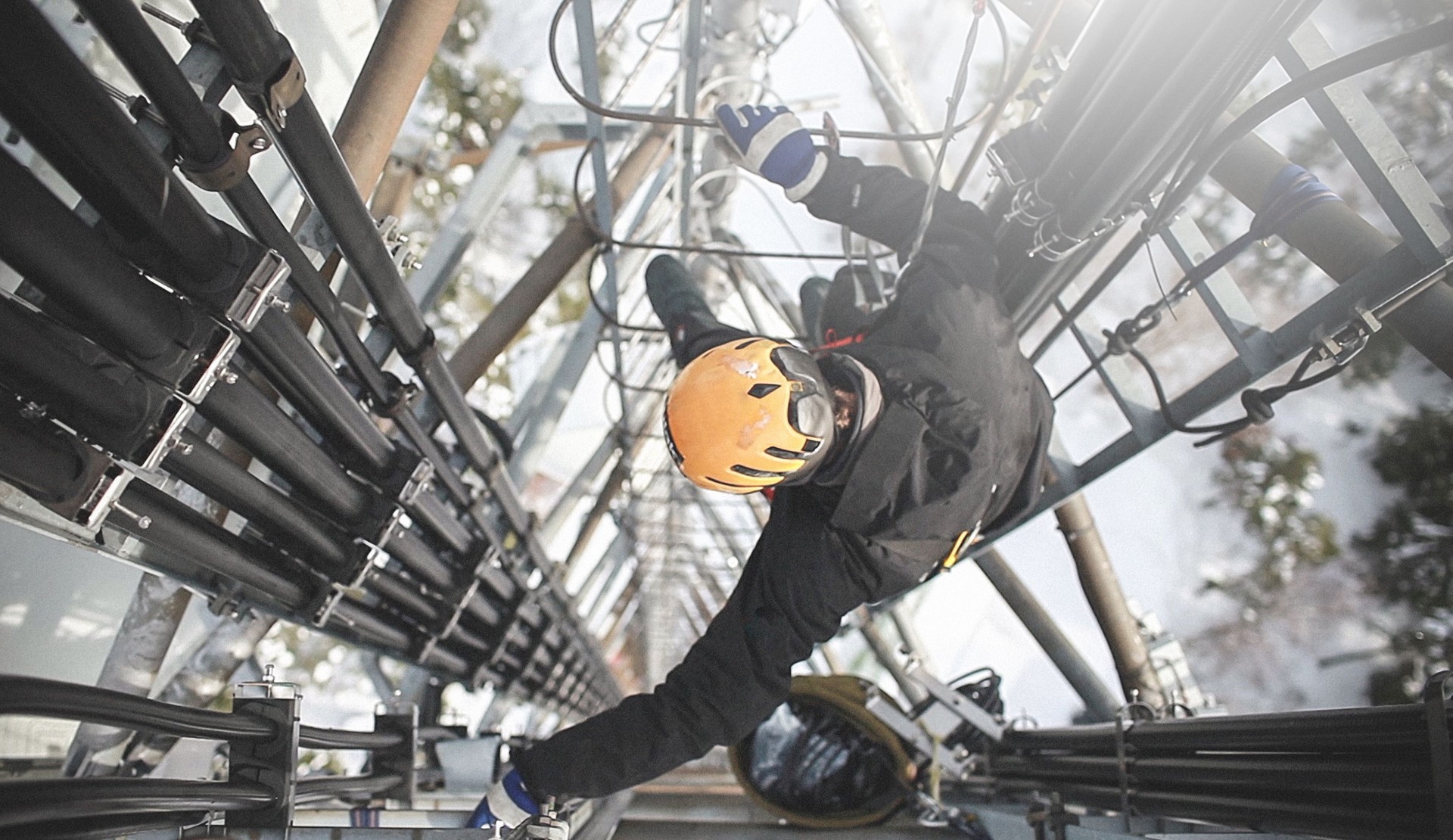 Telecommunication manual high worker engineer repairing antenna